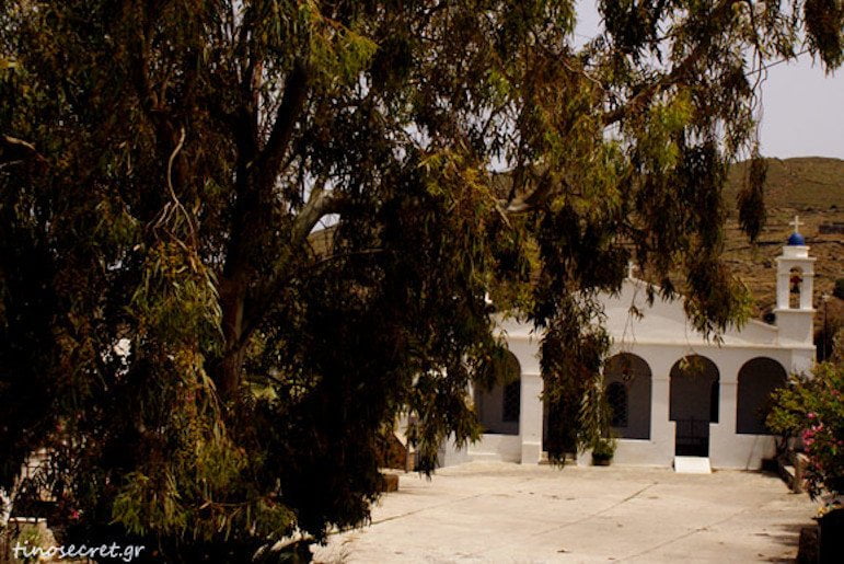 Tinos, Festival of the Virgin of Vourniotissa - Gastronomy Tours front of the monastery of the Virgin of Vourniotissa commemorate their St. at festival at Tinos, Greece surrounded by trees